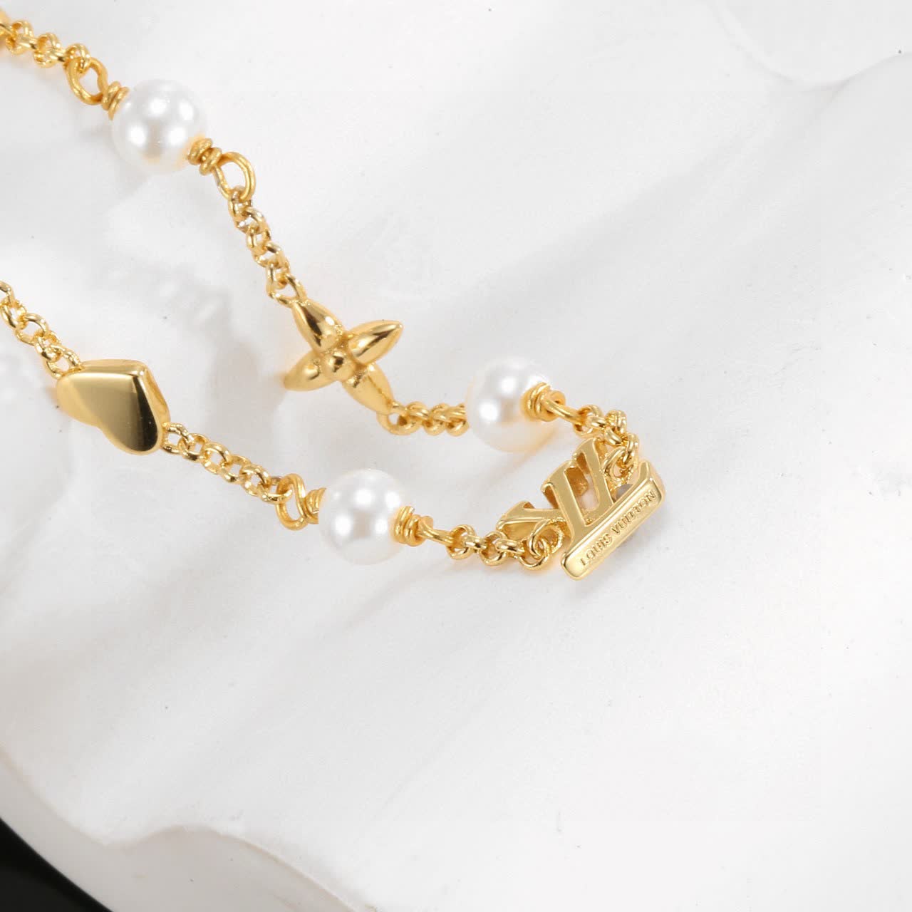 Louis Vuitton Gold Tone Bracelet with Pearls and Charms